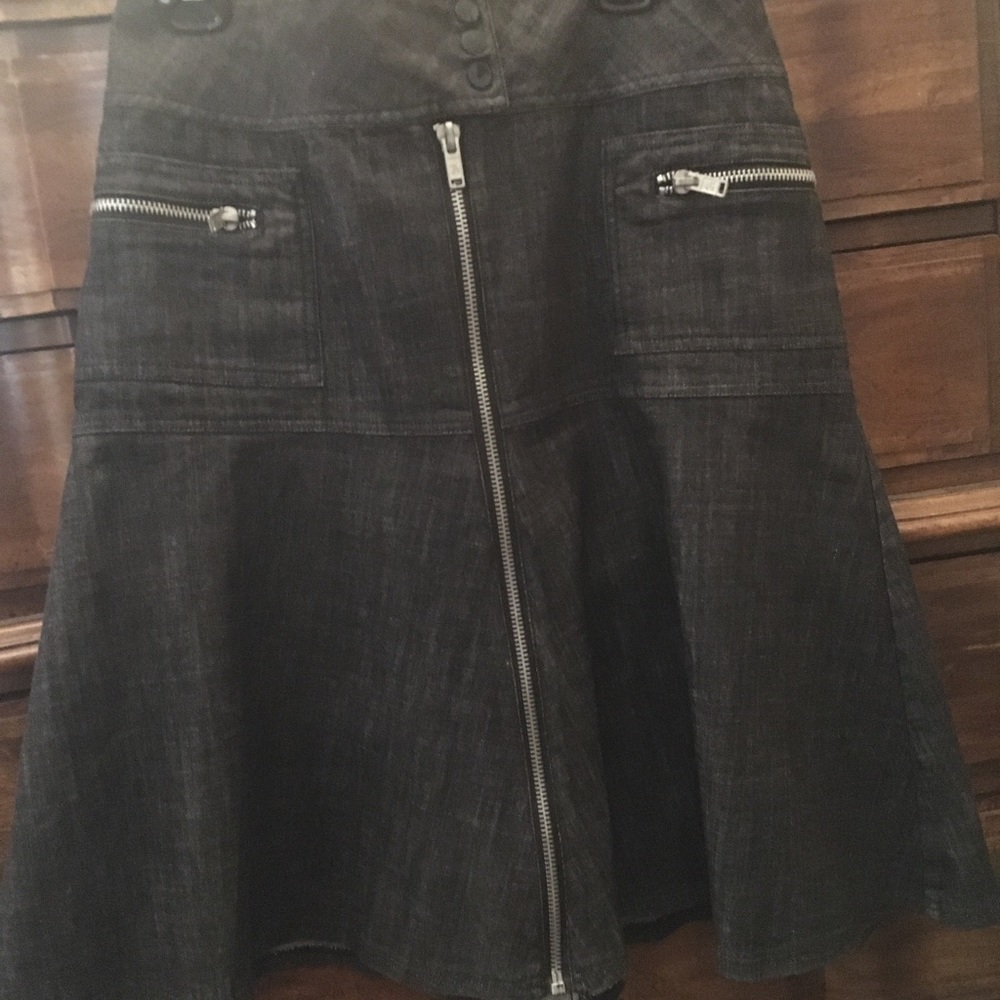 Black jean skirt with a zipper front & pockets